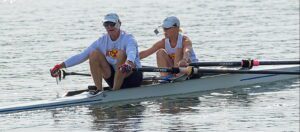 Two rowers in a boat during practice or competition.