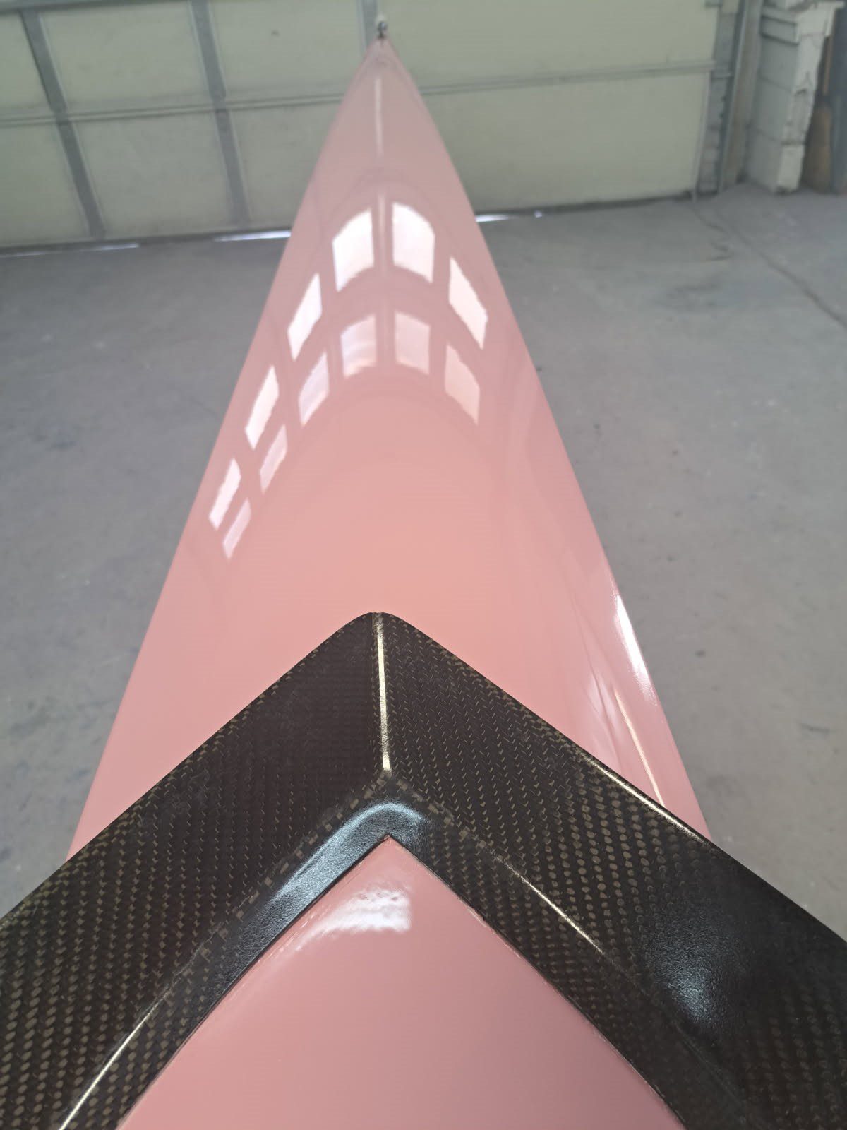 Close-up of a sleek, reflective surface with geometric patterns.